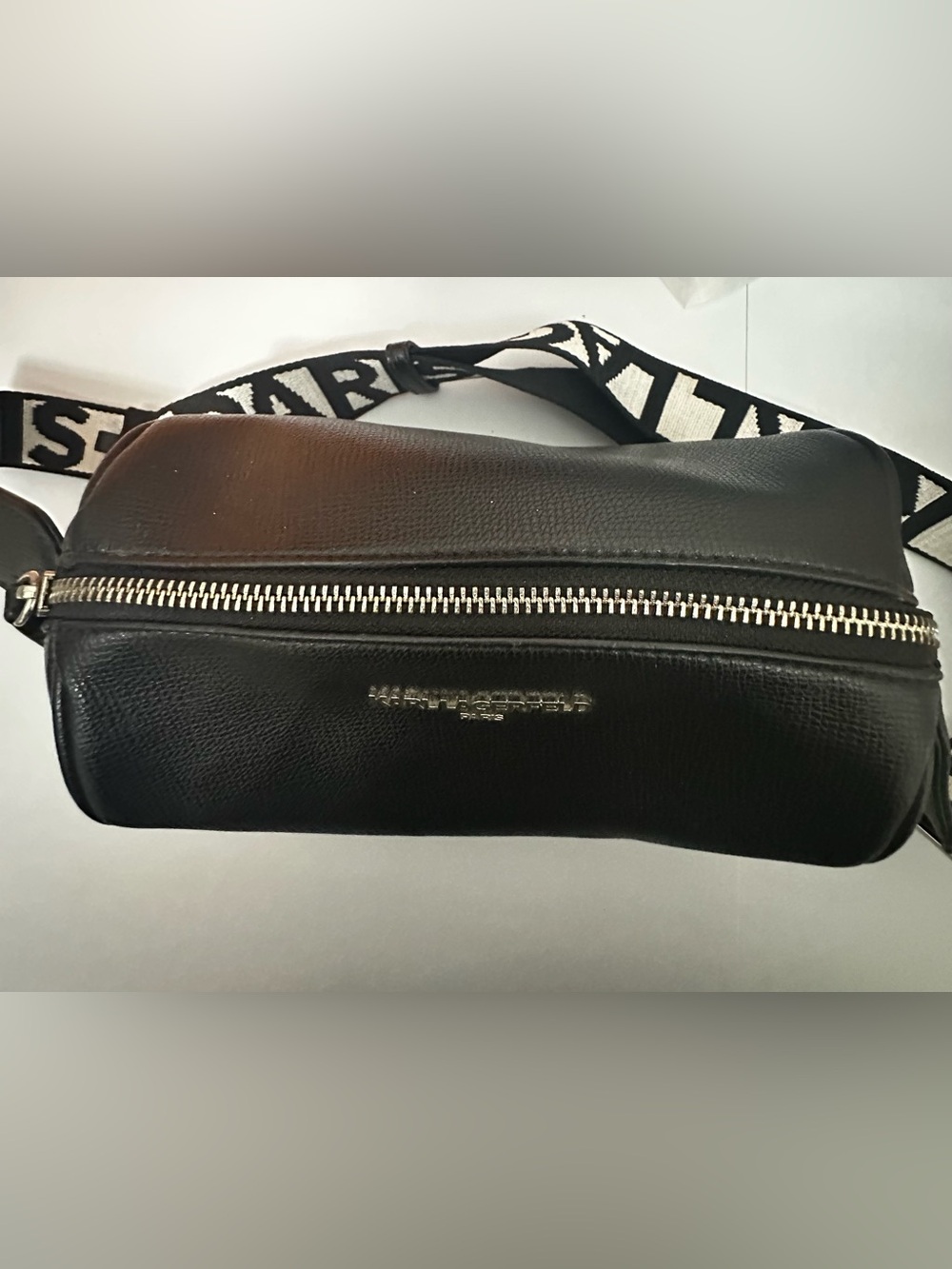 Karl Lagerfeld Paris Black Pebbled Barrel Crossbody Bag with Logo Guitar Strap - Picture 8 of 13